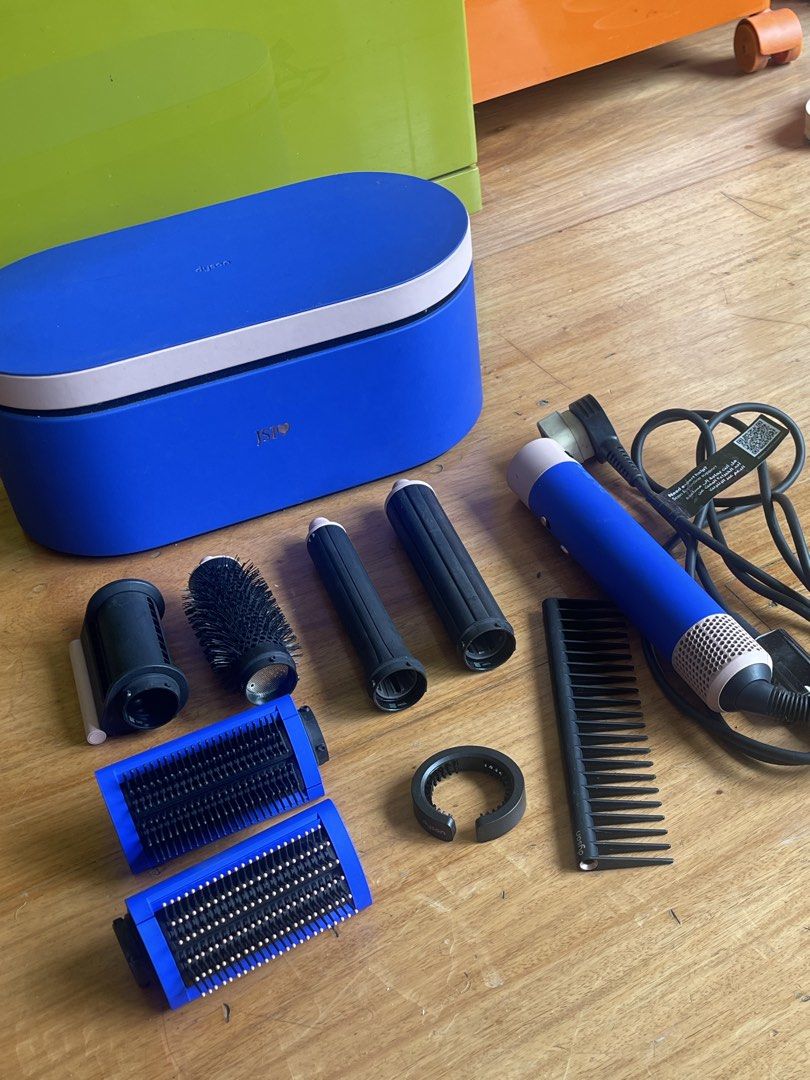 Dyson Airwrap Complete Set Blue (Category: Hair) located in Makati City. Submitted by jmieiii (Listing ID 1449108738, Image 2). Description: - Blue Dyson Airwrap Complete Styler - Includes original storage case - All original attachments included: main unit, barrels, brushes, and comb - Achieve effortless and versatile hair styling - has my initials engraved (only con) .