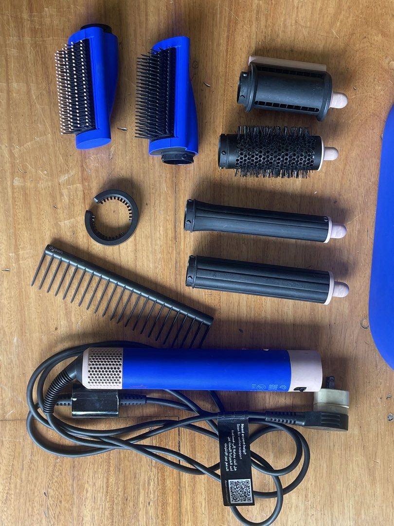 Dyson Airwrap Complete Set Blue (Category: Hair) located in Makati City. Submitted by jmieiii (Listing ID 1449108738, Image 3). Description: - Blue Dyson Airwrap Complete Styler - Includes original storage case - All original attachments included: main unit, barrels, brushes, and comb - Achieve effortless and versatile hair styling - has my initials engraved (only con) .