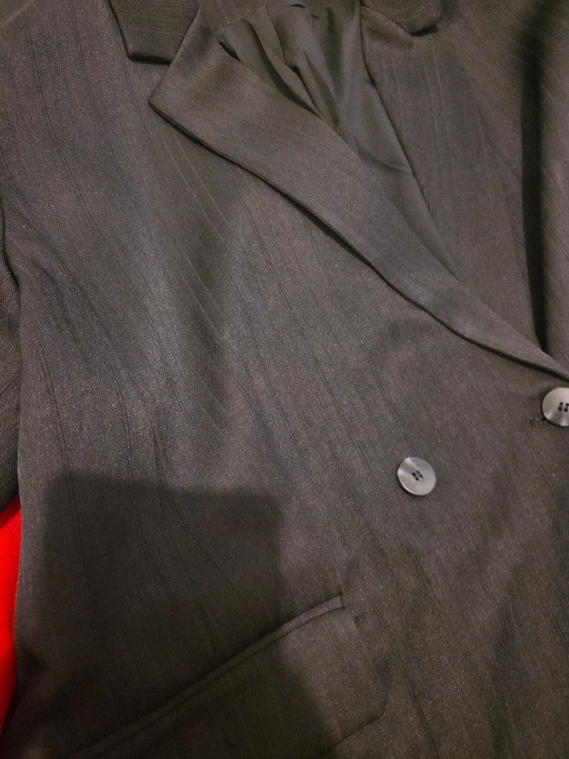 ESSENZA Plus Size Double Breasted Pinstripe Blazer (Category: Coats, Jackets and Outerwear) located in Quezon City. Submitted by frncsbai (Listing ID 1449180162, Image 2). Description: - Classic dark grey blazer with subtle pinstripes - Brand: ESSENZA - Double-breasted front with two buttons - Two front pockets - Versatile for smart casual or formal wear Never been used. SRP is at 3799php, can let go for 3500php Comes with pair slacks, add 1200ph