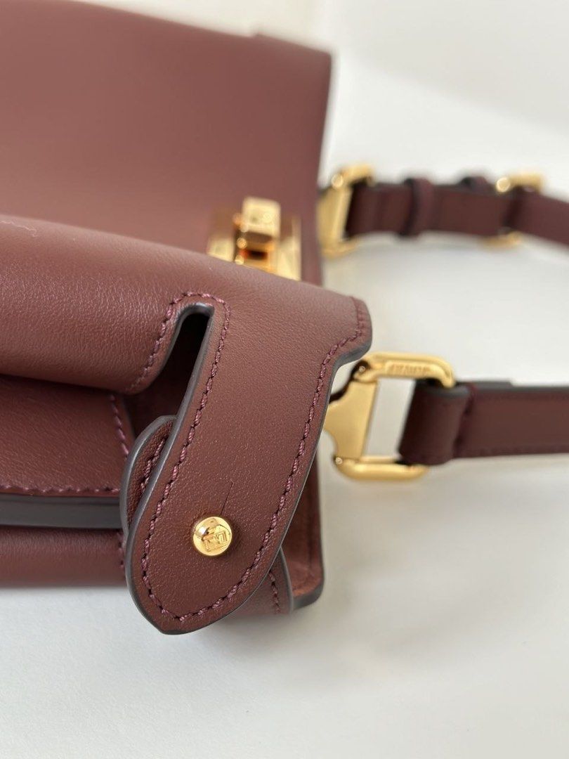 FENDI (Category: Bags & Wallets) located in Kuala Lumpur. Submitted by kiokz (Listing ID 1449298569, Image 3). Description: **FENDI Gift Box Included 🎁** 🔥🔥 **Latest Iconic PEEKABOO Medium Handbag** Crafted from premium calfskin leather, this iconic PEEKABOO bag features a soft, smooth texture with exquisite attention to detail. Both side compartments can be opened, offering generous storage space while maintaining a structured and elegant sil