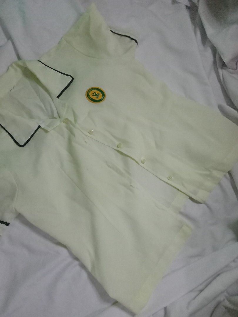 FEU ROOSEVELT SHS UNIFORM TAKE ALL (Category: Sets or Coordinates) located in Manila. Submitted by fleurin (Listing ID 1449169122, Image 1). Description: - School uniform set - Light yellow short-sleeved shirt (Size M) with school emblem and dark trim - Dark green pleated skirt (Size L) - Made in the Philippines - Ideal for school wear.