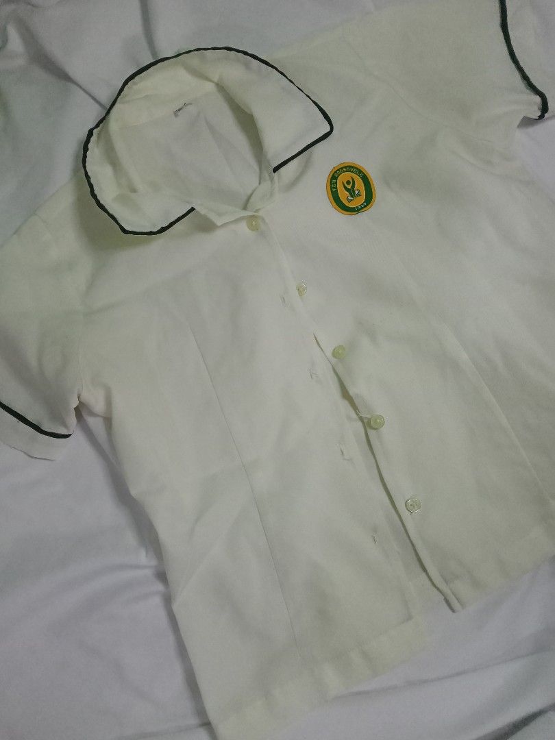 FEU ROOSEVELT SHS UNIFORM TAKE ALL (Category: Sets or Coordinates) located in Manila. Submitted by fleurin (Listing ID 1449169122, Image 3). Description: - School uniform set - Light yellow short-sleeved shirt (Size M) with school emblem and dark trim - Dark green pleated skirt (Size L) - Made in the Philippines - Ideal for school wear.