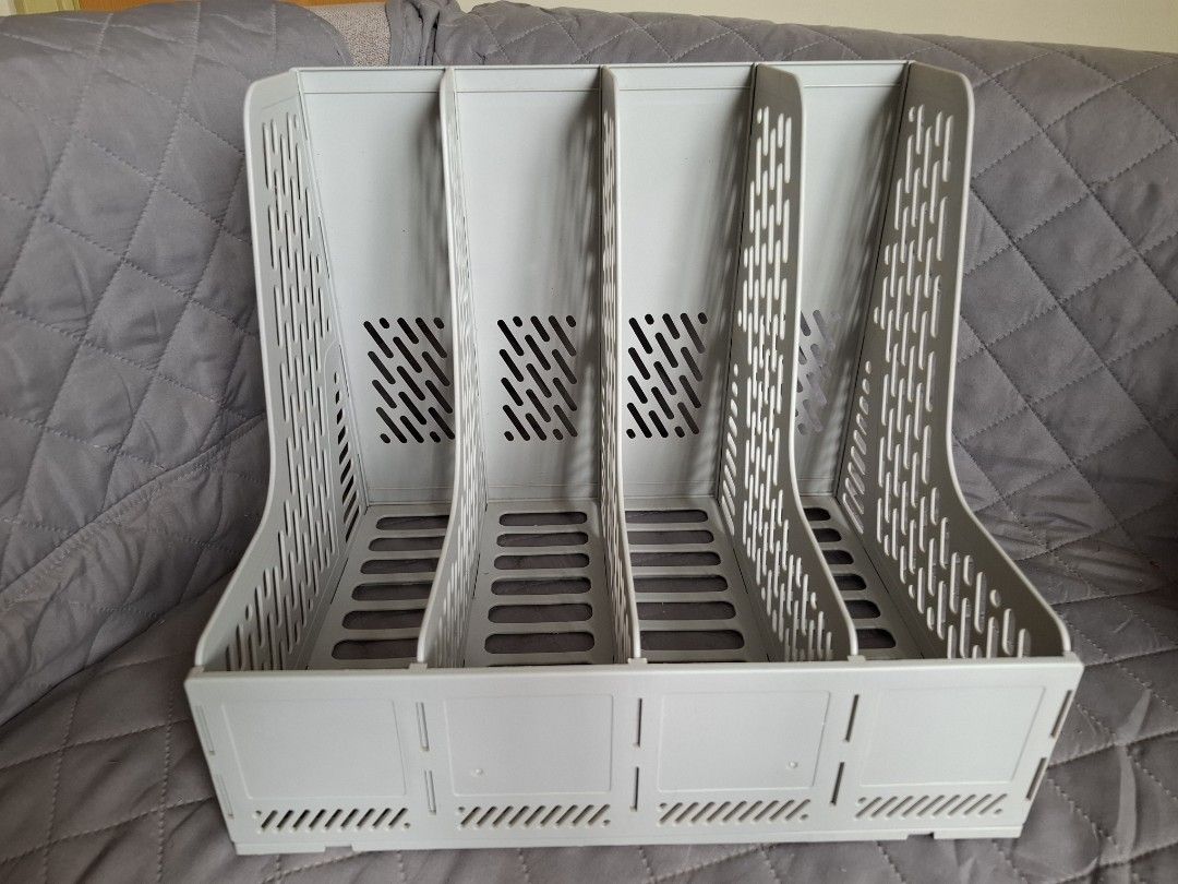 File Holder | Organizer (Category: Storage Boxes & Baskets) located in San Fernando. Submitted by raiaea (Listing ID 1449174774, Image 2). Description: - Keep your desk tidy with this 4-tier file holder. - Perfect for organizing magazines, documents, and notebooks. - Features an open design for easy access to your items. - Made from durable plastic for long-lasting use. - Simple and easy to assemble. - Approximate dimensions: 33cm (L) x 25cm (W) 