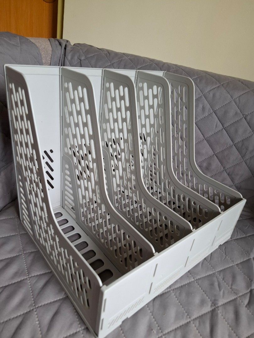 File Holder | Organizer (Category: Storage Boxes & Baskets) located in San Fernando. Submitted by raiaea (Listing ID 1449174774, Image 3). Description: - Keep your desk tidy with this 4-tier file holder. - Perfect for organizing magazines, documents, and notebooks. - Features an open design for easy access to your items. - Made from durable plastic for long-lasting use. - Simple and easy to assemble. - Approximate dimensions: 33cm (L) x 25cm (W) 