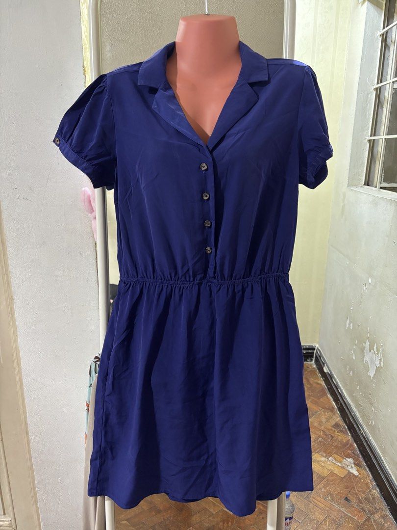 Forever 21 Essentials Royal Blue Button Down Shirt Dress (Category: Dresses) located in Bacoor. Submitted by shamraq (Listing ID 1449203030, Image 1). Description: - Royal blue shirt dress from Forever 21 Essentials - Short sleeves with button cuff details - Elasticated waist for a comfortable fit - Full button-down front - Convenient side pockets - Versatile for casual outings or dressing up.
