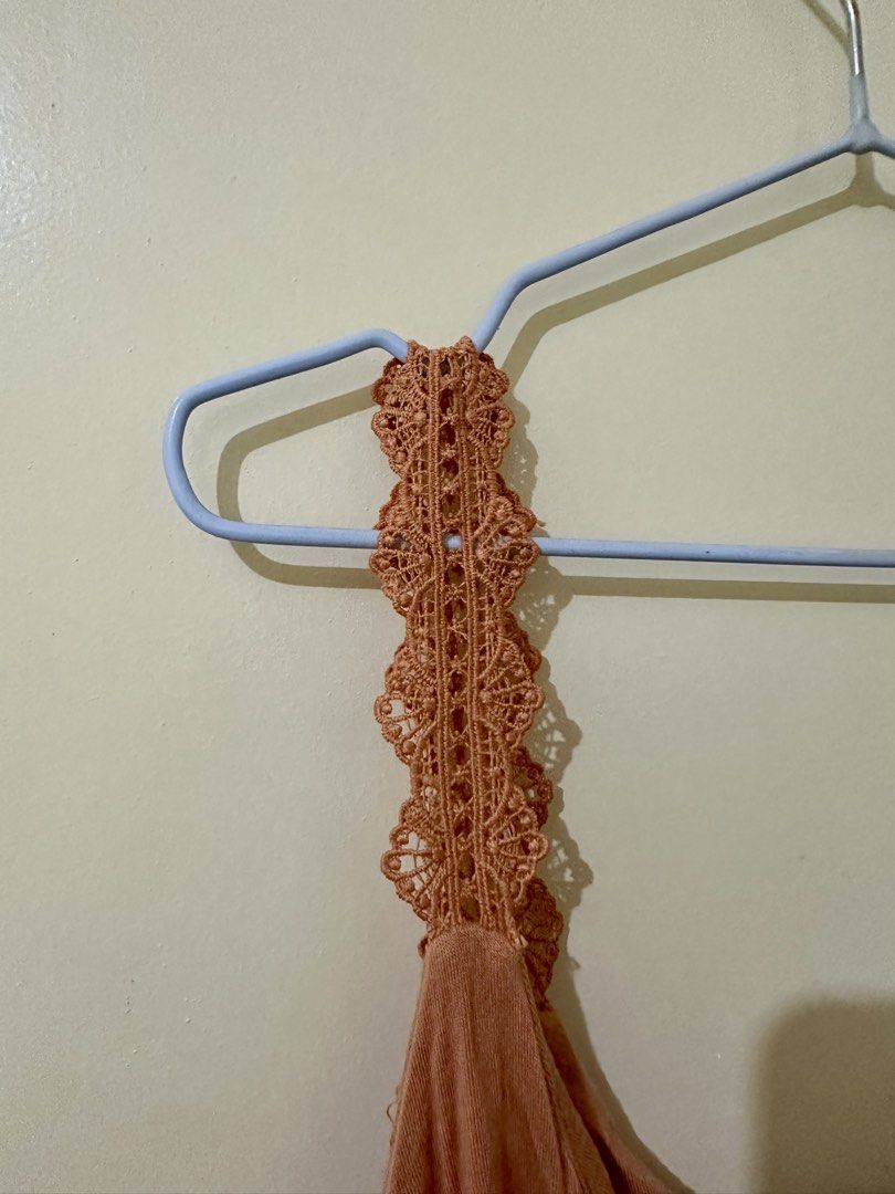 Forever 21 Orange Crochet Strap Tank Top (Category: Sleeveless) located in General Trias. Submitted by amaetr_ (Listing ID 1449215358, Image 3). Description: - Orange tank top from Forever 21 - Features lacy straps - Loose and flowy fit - Ideal for casual wear or layering MOP: Gcash, Maya, or bank transfer Location: General Trias, Cavite / Taguig City ✨ color may vary due to lighting ✨ no cancellation, return/refund, or exchange .