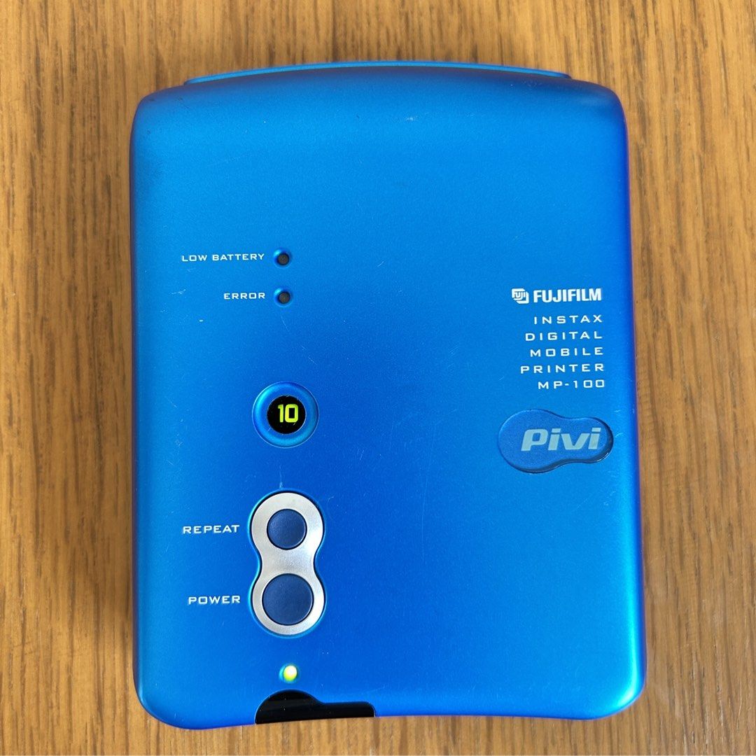 Fujifilm Instax Digital Mobile Printer Pivi MP-100 (Category: Other Photography Accessories) located in Las Pinas. Submitted by pl4y_it_4g4in (Listing ID 1449109648, Image 1). Description: Used Tested battery and dummy film only No sample photo Buttons ok Pls check photos for cosmetic condition .
