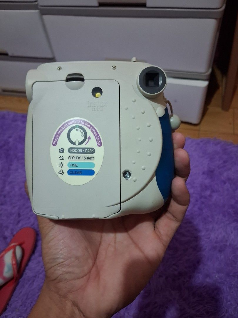 Fujifilm Instax Mini 7S Instant Camera with Clear Case (Category: Cameras) located in Baguio. Submitted by ownedshopps (Listing ID 1449182417, Image 2). Description: - Fujifilm Instax Mini 7S camera - Includes clear protective case - Built-in flash - Adjustable brightness settings - Clean battery compartment - Ideal for instant photo memories - Ready for your next adventure!.