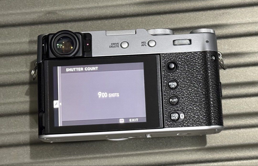 Fujifilm X100VI Silver Camera (900 shutter count) (Category: Cameras) located in Mandaluyong City. Submitted by bookmarkdown (Listing ID 1449287991, Image 3). Description: - Fujifilm X100VI Camera (Silver) - Excellent, almost new condition - Shutter Count: Only 900 shots - Includes Original box, original battery - For security purposes, meetup only at our condo lobby (Twin Oaks Place, Greenfield District, Mandaluyong).