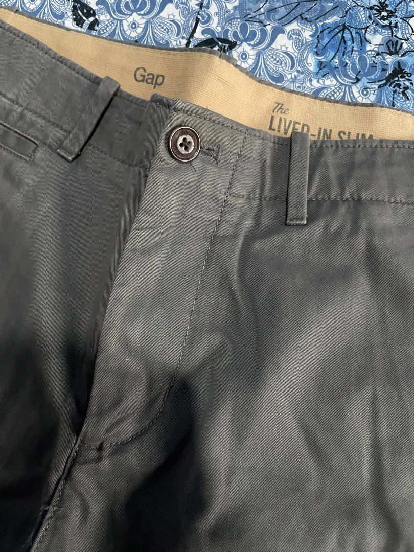 Gap The Lived-In Slim Chino Pants (Category: Chinos) located in Quezon City. Submitted by abc2xxx (Listing ID 1449193509, Image 2). Description: Used Gap Grey Chino Pants - Size: W30 L32 - Closure: Button and zip - Pockets: Two back pockets - Bought in Japan Location: Quezon City around Congressional Extension.