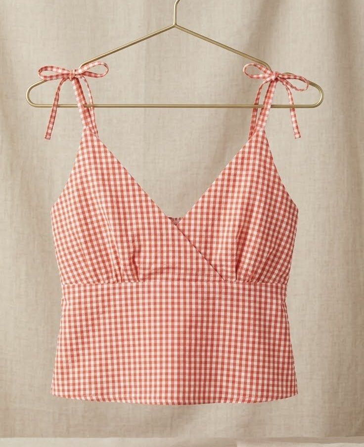 Gingham Tie Strap V-Neck Crop Top (Category: Sleeveless) located in San Juan City. Submitted by Goodstuffhere (Listing ID 1449120201, Image 1). Description: - Adorable gingham print crop top - Flattering V-neck design - Adjustable tie shoulder straps - Cinched waist for a defined silhouette - Ideal for summer and casual outings - Versatile: pairs well with shorts and skirts.