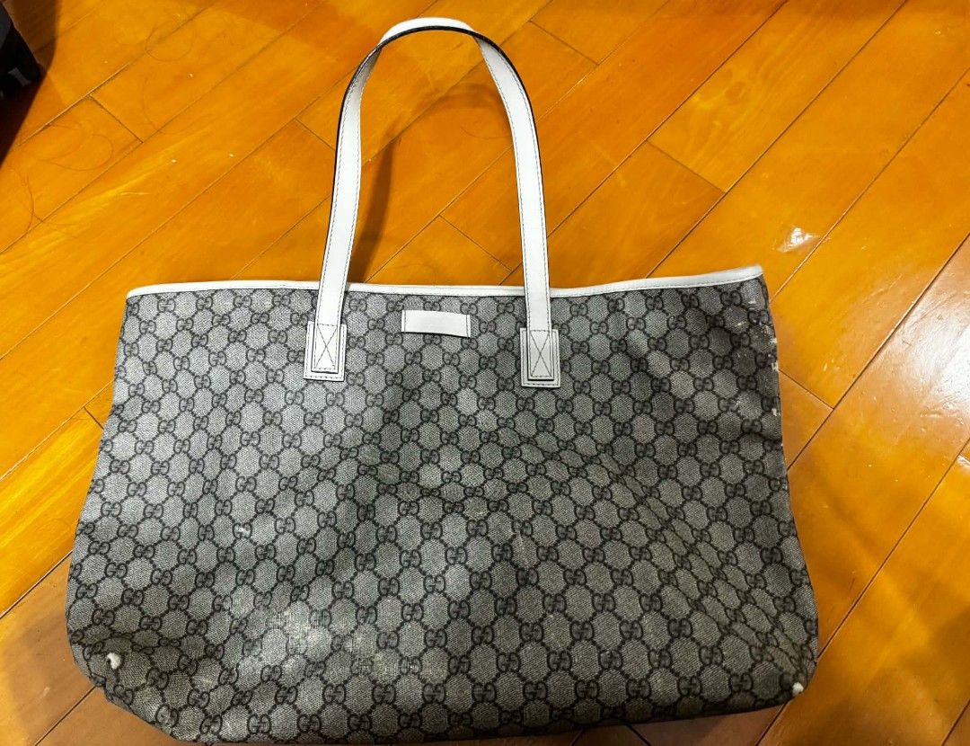 Gucci GG Monogram Tote Bag (Category: Luxury Bags & Wallets) located in Manila. Submitted by yandab (Listing ID 1449280965, Image 1). Description: - Authentic Classic Gucci Tote Bag - Iconic GG Monogram Pattern - White Leather Trim and Handles - Spacious Interior - Ideal for Everyday or Travel - Signs of Wear on Exterior and Corners (as pictured) - Clean Interior.