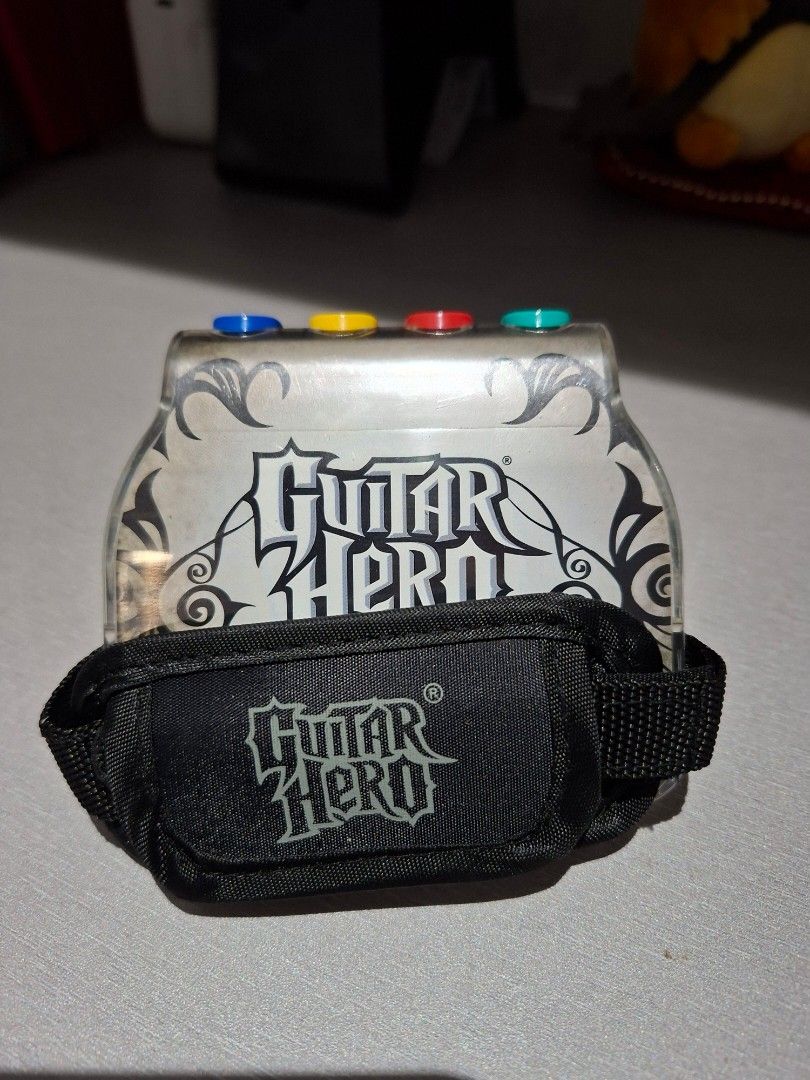 Guitar Hero Guitar Grip for the DS (Category: Controllers) located in Manila. Submitted by tobyhanahaki (Listing ID 1449282610, Image 1). Description: Guitar Hero Guitar Grip for the Nintendo DS, comes with pick and working buttons! mop: gcash mod: lalamove (buyer shoulders shipping fee).