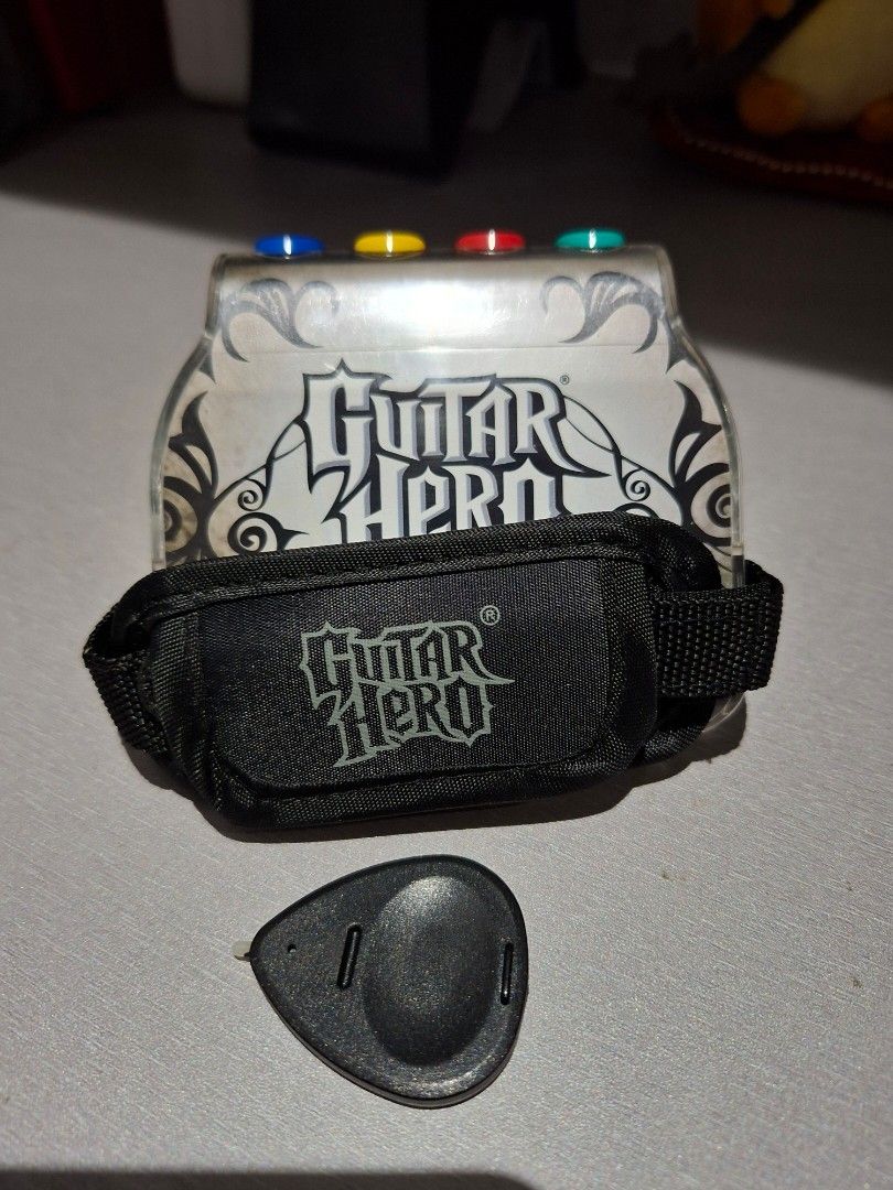 Guitar Hero Guitar Grip for the DS (Category: Controllers) located in Manila. Submitted by tobyhanahaki (Listing ID 1449282610, Image 2). Description: Guitar Hero Guitar Grip for the Nintendo DS, comes with pick and working buttons! mop: gcash mod: lalamove (buyer shoulders shipping fee).