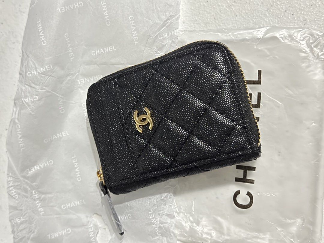 GWP Chanel Black Caviar Quilted Zip Wallet (Category: Luxury Bags & Wallets) located in Antipolo. Submitted by mac.bb (Listing ID 1449254005, Image 2). Description: NO RETURN - NO EXCHANGE This is a GWP item only, not a botique item. Please if may konting hibla jan ng tahi, di po kami reliable dyan. If want ng botique quality bumili kayo ORIGINAL. This item is packed in good condition at hindi po yan sira, sadyang may mga konting imperfections la
