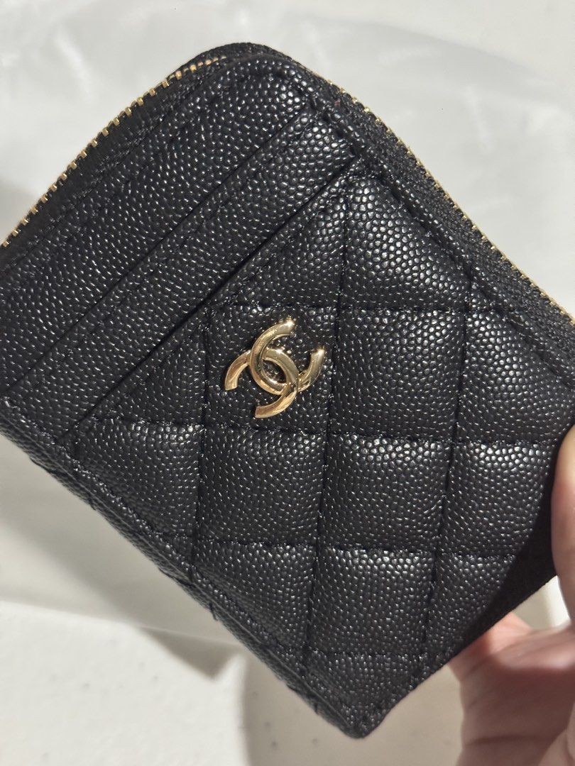 GWP Chanel Black Caviar Quilted Zip Wallet (Category: Luxury Bags & Wallets) located in Antipolo. Submitted by mac.bb (Listing ID 1449254005, Image 1). Description: NO RETURN - NO EXCHANGE This is a GWP item only, not a botique item. Please if may konting hibla jan ng tahi, di po kami reliable dyan. If want ng botique quality bumili kayo ORIGINAL. This item is packed in good condition at hindi po yan sira, sadyang may mga konting imperfections la