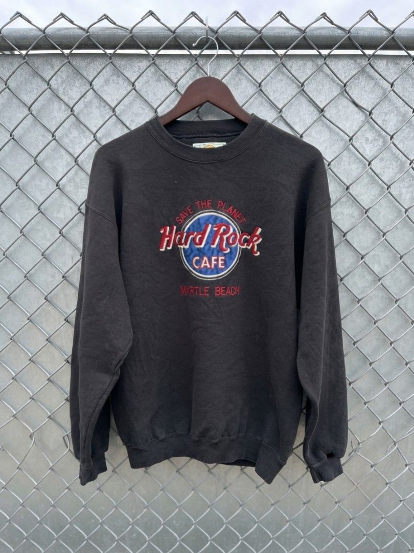 Hard Rock Cafe Myrtle Beach Embroidered Sweatshirt Medium (Category: Coats, Jackets and Outerwear) located in Manila. Submitted by darth3pter (Listing ID 1444925600, Image 1). Description: - Authentic Hard Rock Cafe sweatshirt from Myrtle Beach - Features the iconic embroidered logo on the front - Proudly Made in the USA - Size: Medium - Color: Dark Grey - Perfect for Hard Rock Cafe enthusiasts!.
