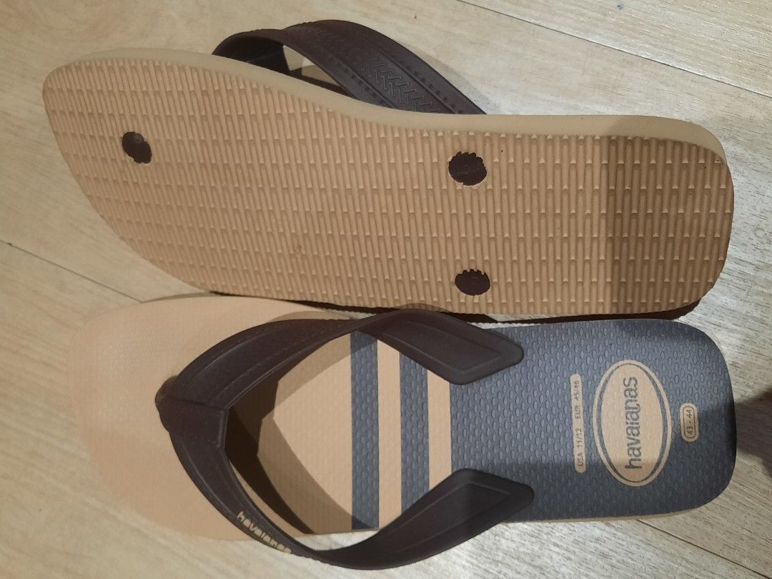 Havaianas Flip-Flops Brown/Beige Size 45/46 (Category: Slippers and slides) located in Manila. Submitted by epictree.a37e8d (Listing ID 1449254420, Image 2). Description: - Havaianas Flip-Flops - Color: Brown and Beige - Design: Striped footbed - Features: Textured sole for enhanced grip - Size: 45/46 EUR - Ideal for: Casual wear, beach trips - Benefits: Comfortable and durable.