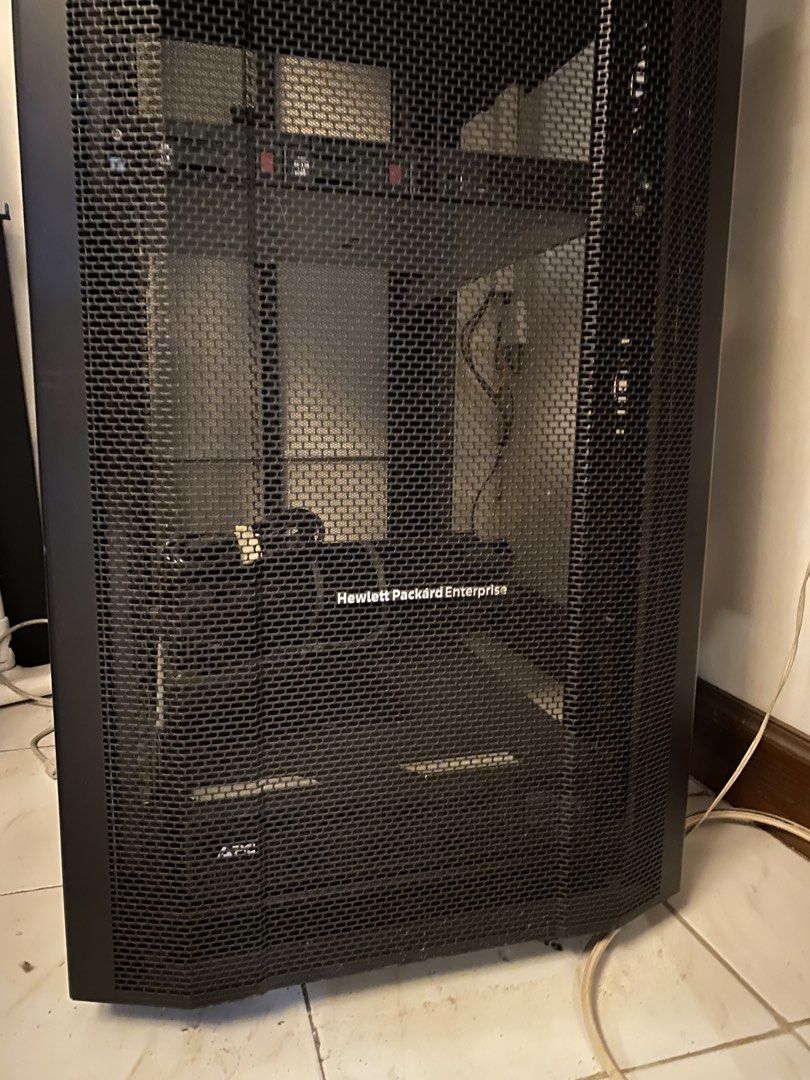 Hewlett Packard Enterprise Server Rack with Networking Equipment (Category: Office & Business Technology) located in Manila. Submitted by tavorafrancis8096 (Listing ID 1449128568, Image 1). Description: - Full-size server rack with Hewlett Packard Enterprise branding - Includes various networking switches and equipment (Cisco, Netgate) - Features an APC UPS unit at the bottom - Ideal for home lab or small business setups - Sold as a complete unit