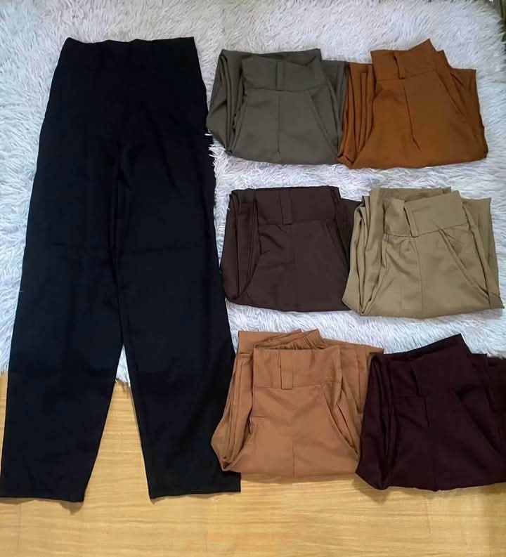 High Waisted Wide Leg Pants - Multiple Colors Available (Category: Other Bottoms) located in Manila. Submitted by themayangshop (Listing ID 1449134623, Image 2). Description: - High-waisted design - Flattering wide-leg fit - Available colors: Black, Dark Brown, Brown, Nude, Light Nude, khaki - Relaxed silhouette for ultimate comfort - Comfortable waistband - Versatile for casual or dressed-up outfits - Easy to style with various tops and footwear