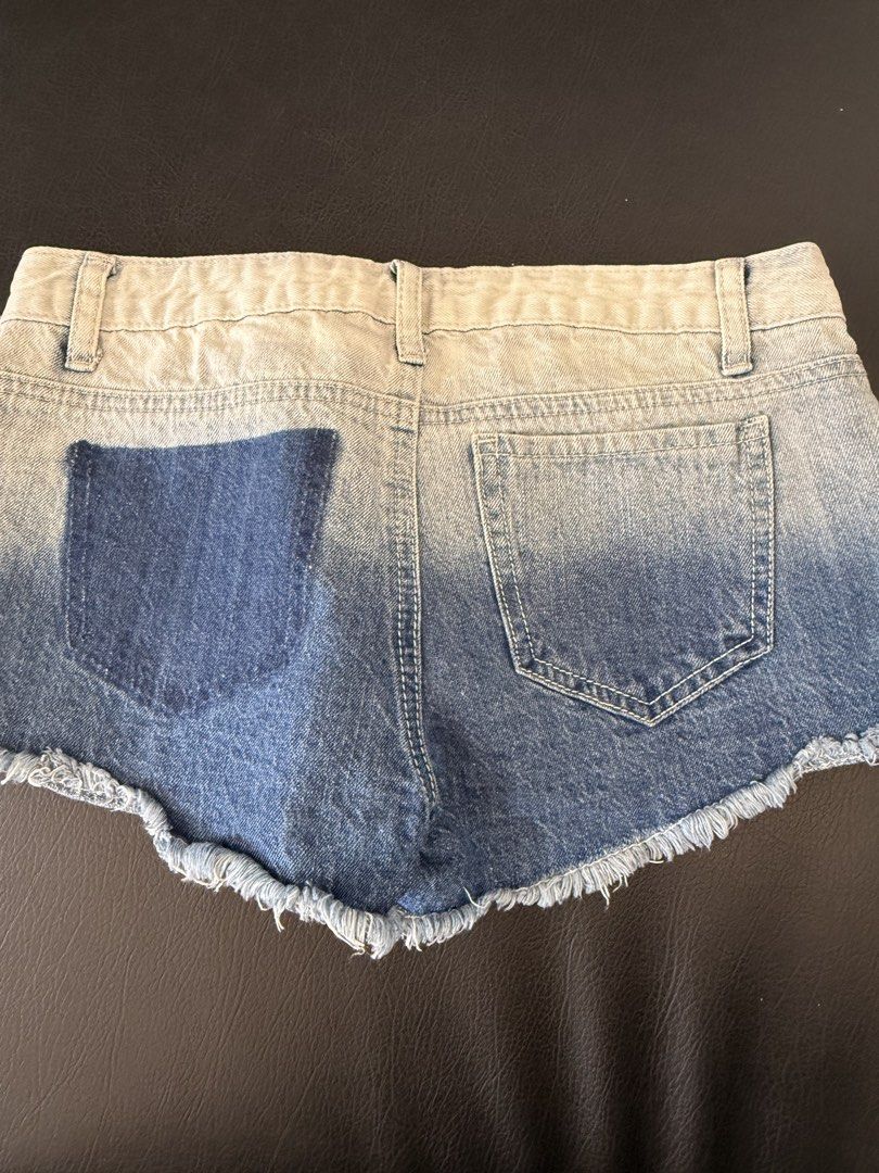 Hippie Laundry Denim Shorts Size 26 (Category: Shorts) located in Bulacan. Submitted by emjay_17 (Listing ID 1449144460, Image 3). Description: - Brand: Hippie Laundry - Size: 26 - Style: Cute denim shorts with patchwork and distressed look - Details: Frayed hem - Occasion: Casual wear - Material: 100% Cotton - Origin: Made in China.