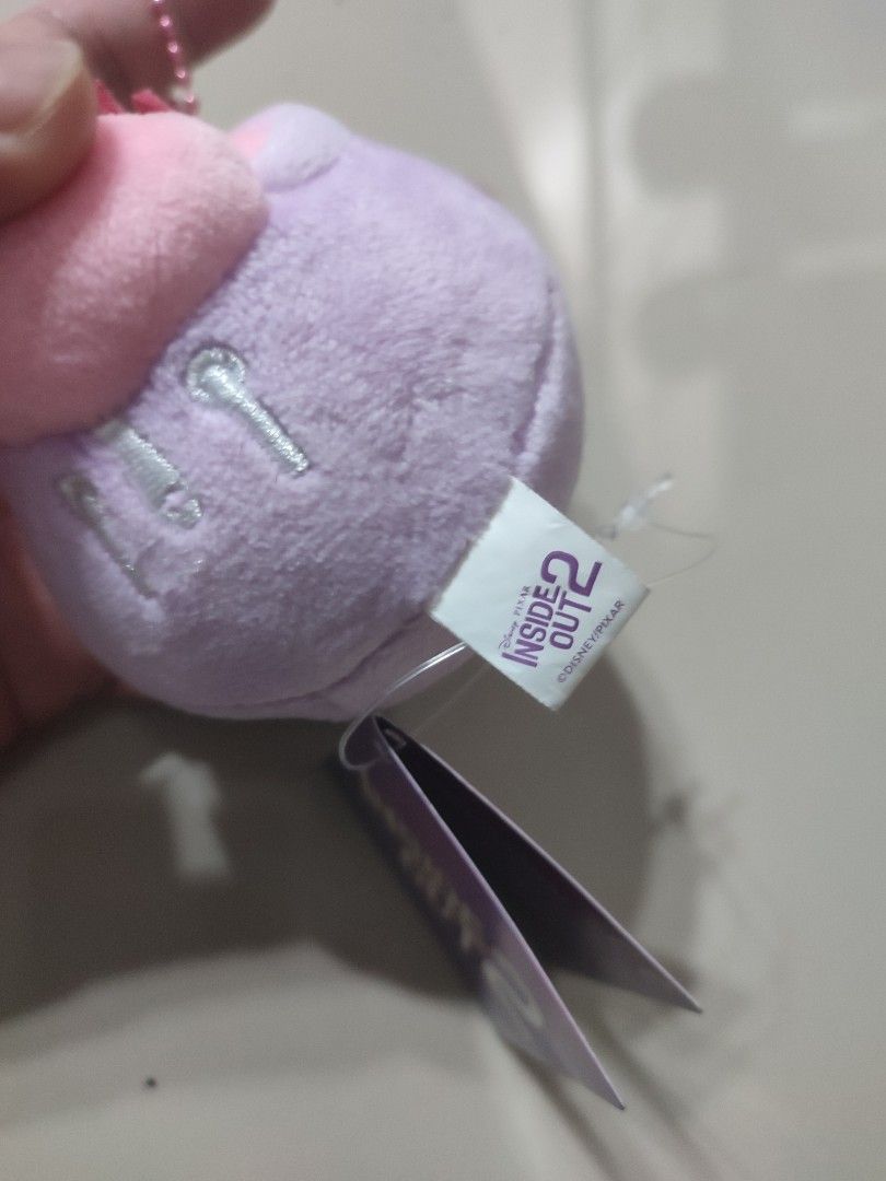 Inside Out 2 Sadness Plush Keychain (Category: Plushies & Soft Toys) located in Manila. Submitted by epicmountain-f20453 (Listing ID 1449118433, Image 2). Description: - Adorable Sadness plush keychain from Inside Out 2 - Made with soft and squishy material - Features a durable metal chain for easy attachment - Ideal for fans of the movie - Brand new with original tags still attached.