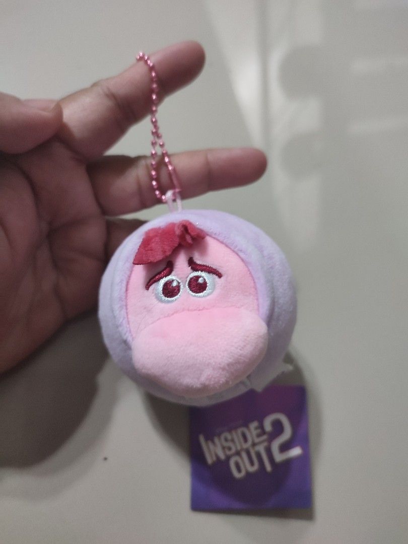 Inside Out 2 Sadness Plush Keychain (Category: Plushies & Soft Toys) located in Manila. Submitted by epicmountain-f20453 (Listing ID 1449118433, Image 1). Description: - Adorable Sadness plush keychain from Inside Out 2 - Made with soft and squishy material - Features a durable metal chain for easy attachment - Ideal for fans of the movie - Brand new with original tags still attached.