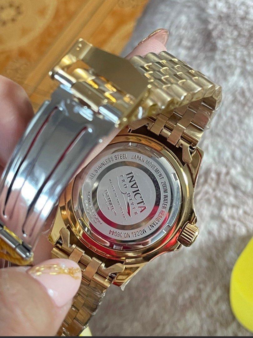 Invicta Watch 36044 (Category: Men's Watches) located in Caloocan City. Submitted by trishhhaaa (Listing ID 1449113289, Image 3). Description: - Invicta Pro Diver Watch - Stunning Gold Tone with Green Bezel - Reliable Automatic Movement - 200m Water Resistance - Durable All Stainless Steel Construction - Includes Original Invicta Box - Ideal for Everyday Wear and Diving Adventures - Negotiable https://www.invictawatch.com/watches/detail/36044-pro