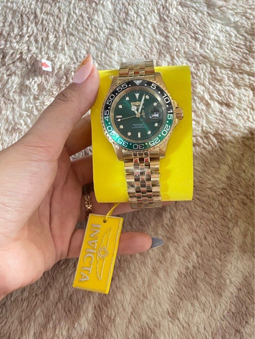 Invicta Watch 36044 (Category: Men's Watches) located in Caloocan City. Submitted by trishhhaaa (Listing ID 1449113289, Image 2). Description: - Invicta Pro Diver Watch - Stunning Gold Tone with Green Bezel - Reliable Automatic Movement - 200m Water Resistance - Durable All Stainless Steel Construction - Includes Original Invicta Box - Ideal for Everyday Wear and Diving Adventures - Negotiable https://www.invictawatch.com/watches/detail/36044-pro