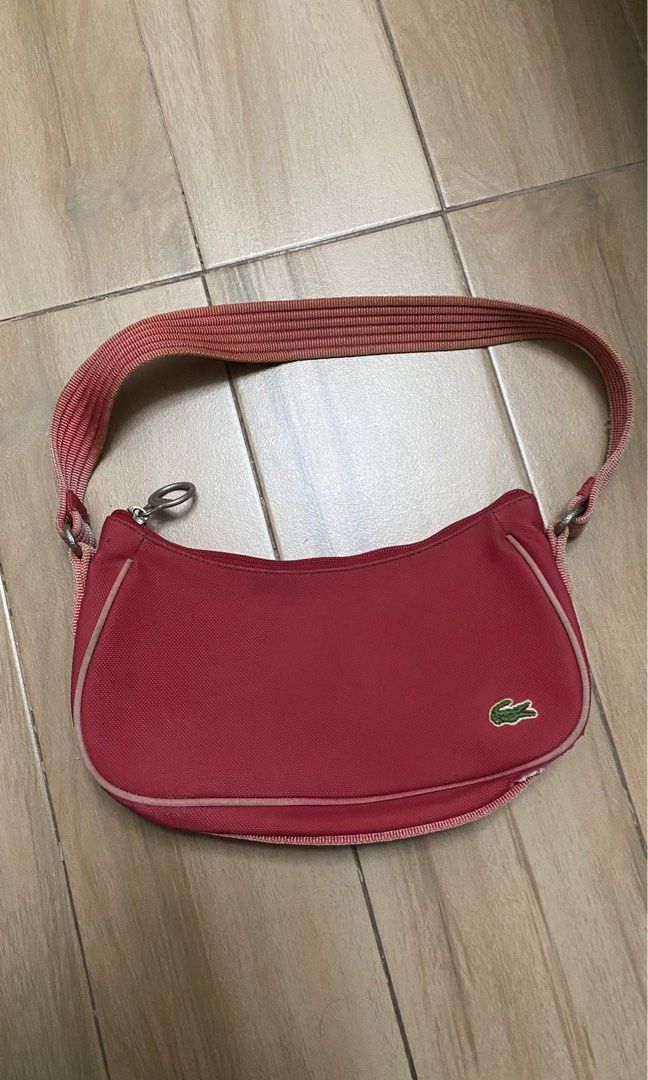 Lacoste Vintage Shoulder Bag (Category: Shoulder Bags) located in Las Pinas. Submitted by baeksilog (Listing ID 1449300813, Image 1). Description: Lacoste Red Handbag - Major defects ‼️ - Can send more pictures - Cannot verify auth3nticity - Price still nego! MOP: GCash, Maya, Bank Transfer MOD: J&T, Lalamove, Grab c/o buyer Can also meet up around las piñas or alabang .