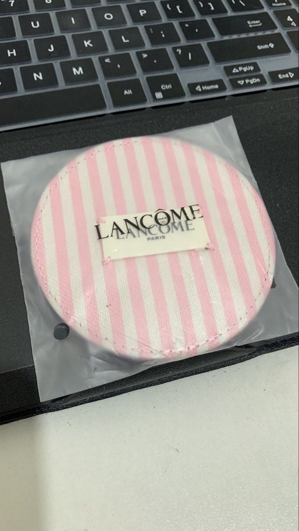Lancome Paris Pink Striped Compact Mirror with Pouch (Category: Makeup) located in Batangas. Submitted by lifewithxhan.ph (Listing ID 1449302392, Image 2). Description: - Cute pink and white striped compact mirror from Lancome Paris. - Includes a matching fabric pouch. - Mirror cover still attached, it is not scratches 😊 - Ideal for quick touch-ups anytime, anywhere. - Compact and convenient for your bag..