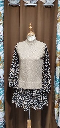 Leopard Print Two-Piece Set with Beige Vest (Category: Sets or Coordinates) located in Batangas. Submitted by 8ACesonlineshop (Listing ID 1449302120, Image 2). Description: - Leopard print long sleeve top - Matching leopard print skirt - Beige knit vest with mock neck - Small emblem detail on vest - Bold and playful statement outfit.