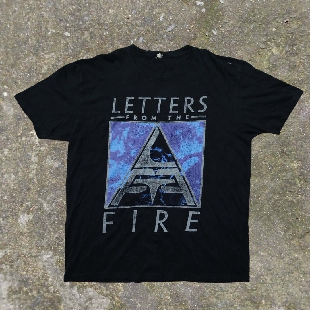 Letters from the Fire Band Tee (Category: Tshirts & Polo Shirts ) located in Quezon City. Submitted by rorshack (Listing ID 1449319017, Image 1). Description: Letters from the Fire was an American hard rock[2] band from San Francisco, California[3] founded in 2012 23 WIDTH 29 LENGTH multiple pinholes.