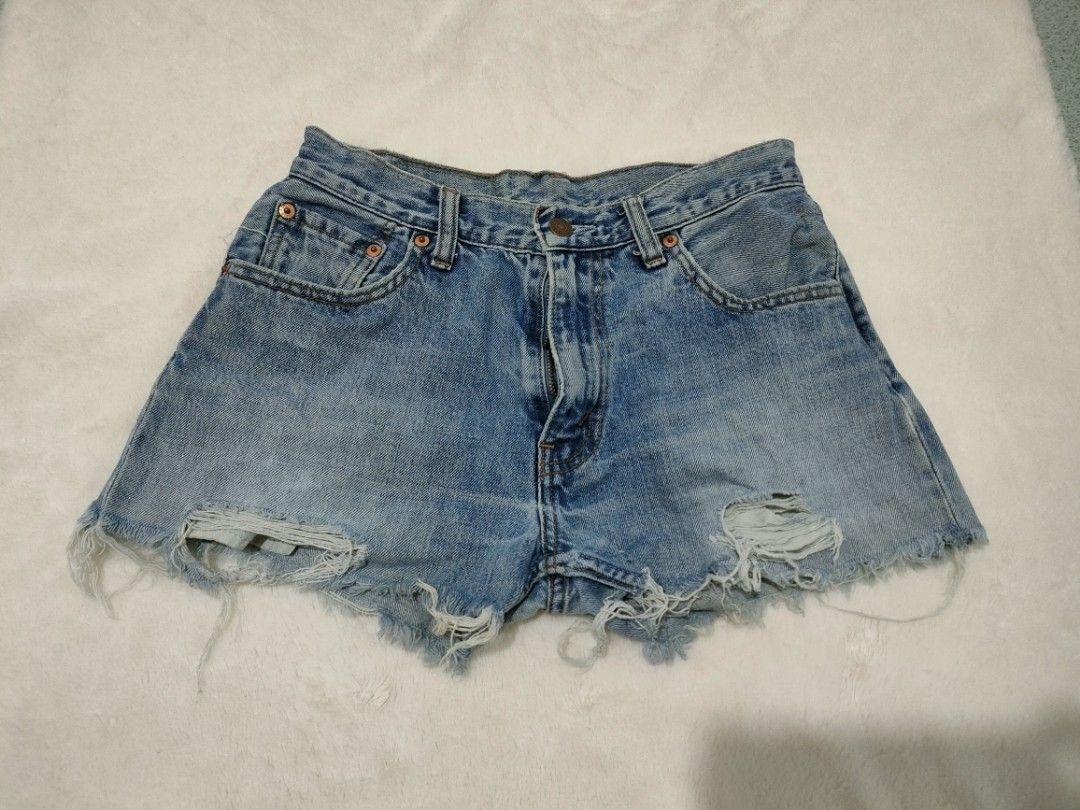 Levi's Distressed Denim Cut-Off Shorts (Category: Shorts) located in General Santos City (Dadiangas). Submitted by rjb21 (Listing ID 1449135679, Image 1). Description: -size 29 -Classic Levi's denim shorts - Light blue wash with distressed look - Frayed hem and ripped details - Button fly closure - Ideal for casual wear - Wardrobe staple.