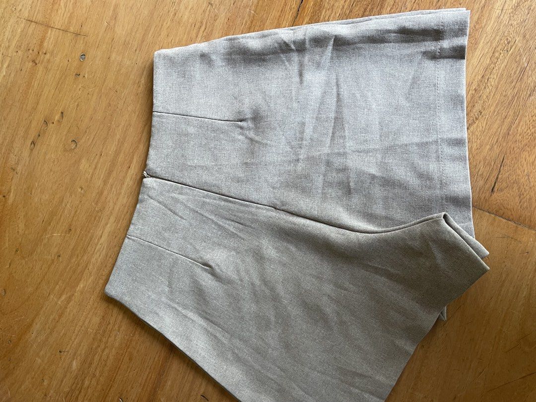 Light Beige High-Waisted Shorts with Double Button Detail (Category: Shorts) located in Makati City. Submitted by jmieiii (Listing ID 1449139903, Image 3). Description: - Light beige color - High-waisted design - Double button closure at the front - Side zipper for easy wear - Tailored fit for a polished look - Versatile for dressing up or down.
