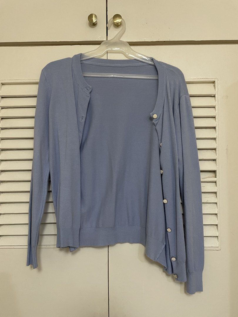 Light Blue Button-Up Cardigan with Pearl Buttons (Category: Coats, Jackets and Outerwear) located in Calamba. Submitted by melibear (Listing ID 1449242381, Image 1). Description: - Light blue knit cardigan - Features pearl-like buttons down the front - Long sleeves - Soft and comfortable material - Classic and versatile design, perfect for layering over tops or dresses.