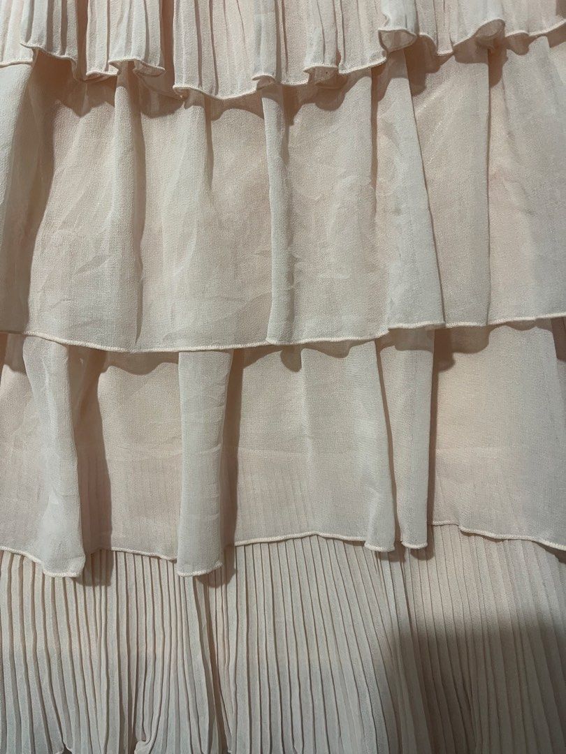 Light Pink Tiered Chiffon Ruffle Dress (Category: Dresses) located in Mandaluyong City. Submitted by blzstr (Listing ID 1449277437, Image 3). Description: - Adorable light pink dress - Features charming ruffles and pleats - adjustable spaghetti straps - Smooth, silky lining for comfort - Tagged as Size 40.