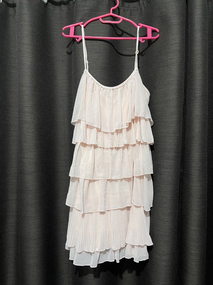 Light Pink Tiered Chiffon Ruffle Dress (Category: Dresses) located in Mandaluyong City. Submitted by blzstr (Listing ID 1449277437, Image 1). Description: - Adorable light pink dress - Features charming ruffles and pleats - adjustable spaghetti straps - Smooth, silky lining for comfort - Tagged as Size 40.