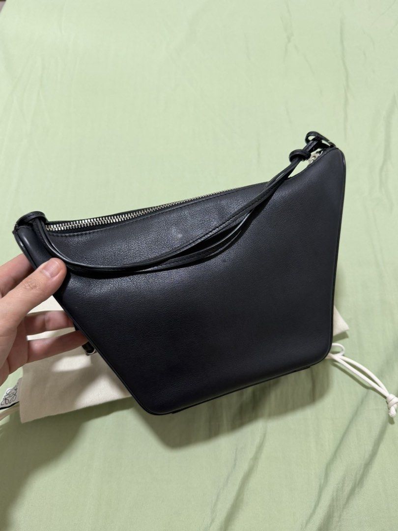 Loewe Black Leather Mini Gate Dual Bag (Category: Luxury Bags & Wallets) located in Manila. Submitted by midlemanalac (Listing ID 1449112649, Image 2). Description: - Genuine black leather mini bag - Secure zip closure - Structured base for stability - Compact size, ideal for carrying essentials - Beautiful leather sheen - Embossed Loewe logo on a separate leather tab - Comes with a protective dust bag.