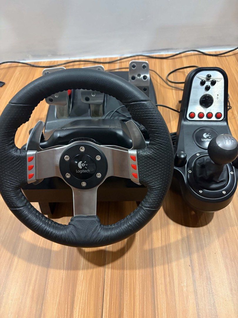 Logitech G27 Racing Wheel and Pedals Shifter (Category: Controllers) located in Manila. Submitted by joshsison102148 (Listing ID 1449181979, Image 1). Description: NO ISSUE may wrap pa yung shifter Complete original cables NEGO Meetup or lalamove Rfs: gpu funds.