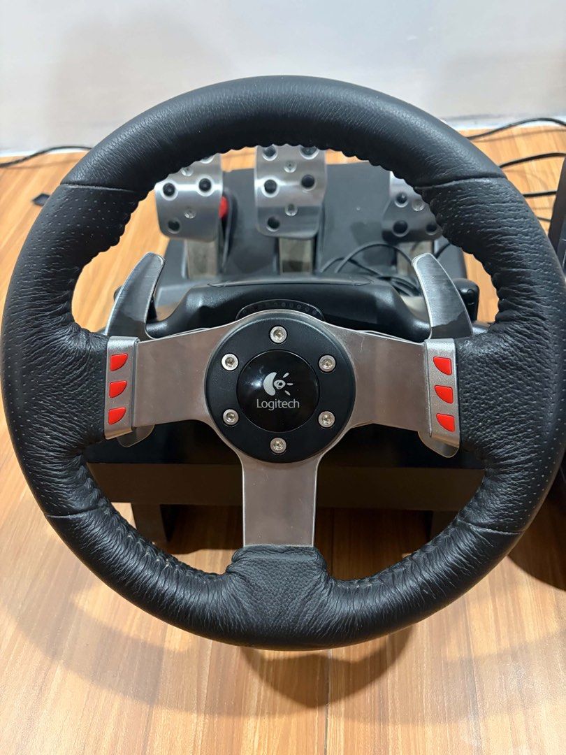 Logitech G27 Racing Wheel and Pedals Shifter (Category: Controllers) located in Manila. Submitted by joshsison102148 (Listing ID 1449181979, Image 2). Description: NO ISSUE may wrap pa yung shifter Complete original cables NEGO Meetup or lalamove Rfs: gpu funds.