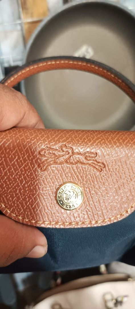 LONG CHAMP MINI BAG (Category: Luxury Bags & Wallets) located in Makati City. Submitted by egsdhadghas (Listing ID 1449181380, Image 3). Description: LIKE NEW CONDITION. AUTHENTIC.