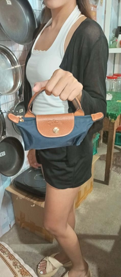 LONG CHAMP MINI BAG (Category: Luxury Bags & Wallets) located in Makati City. Submitted by egsdhadghas (Listing ID 1449181380, Image 2). Description: LIKE NEW CONDITION. AUTHENTIC.