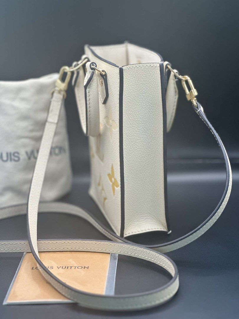 Louis Vuitton Monogram Empreinte Nano Speedy Bag (Category: Luxury Bags & Wallets) located in Midsayap. Submitted by bagski (Listing ID 1449325826, Image 2). Description: - Louis Vuitton Nano Speedy bag - Color: Creamy white with yellow and beige monogram empreinte - Hardware: Gold - Strap: Adjustable, for crossbody wear - Interior: Card slot - Includes: Dust bag and care card - Ideal for carrying essentials.