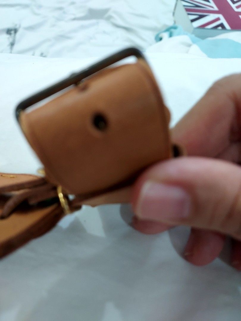 Louis Vuitton Monogram Leather Luggage Tag with handler (Category: Luxury Bags & Wallets) located in Paranaque City. Submitted by andim8 (Listing ID 1449196401, Image 3). Description: - Authentic Louis Vuitton luggage tag - Classic monogram pattern on quality leather - Adjustable and secure strap - Ideal for identifying luggage - Shows some signs of wear, but fully functional - A timeless travel accessory.