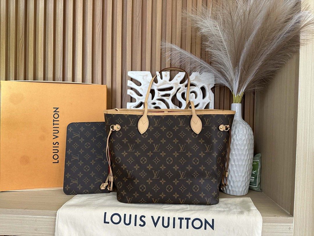 Louis Vuitton Neverfull MM Handbag (Category: Luxury Bags & Wallets) located in San Fernando. Submitted by naronvgs (Listing ID 1449177212, Image 1). Description: - Authentic Louis Vuitton Neverfull MM handbag - Iconic Monogram canvas - Leather handles - Spacious interior - Includes original dust bag and box - Matching pouch included.