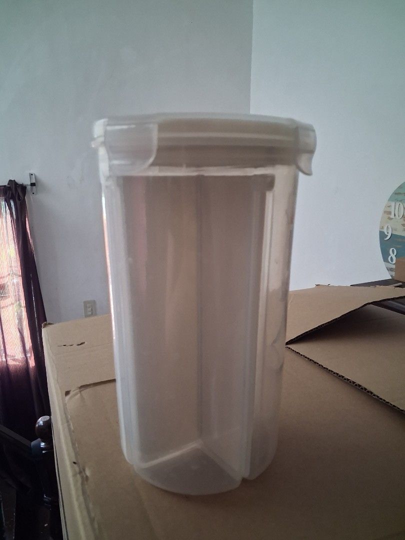 Make room and more brand Clear Plastic Storage Container with Lid (Category: Storage Boxes & Baskets) located in Dasmarinas. Submitted by theminimalisttryon (Listing ID 1449324973, Image 1). Description: canister from make room and more - Clear plastic storage container - Round lid with a convenient handle - Features four internal sections for organization - Ideal for storing small items like craft supplies, hardware, or accessories - Shows some 