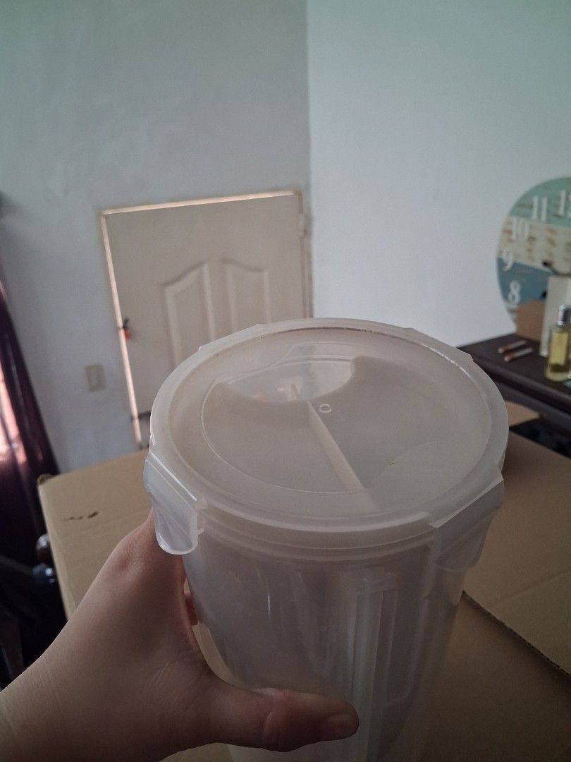 Make room and more brand Clear Plastic Storage Container with Lid (Category: Storage Boxes & Baskets) located in Dasmarinas. Submitted by theminimalisttryon (Listing ID 1449324973, Image 3). Description: canister from make room and more - Clear plastic storage container - Round lid with a convenient handle - Features four internal sections for organization - Ideal for storing small items like craft supplies, hardware, or accessories - Shows some 