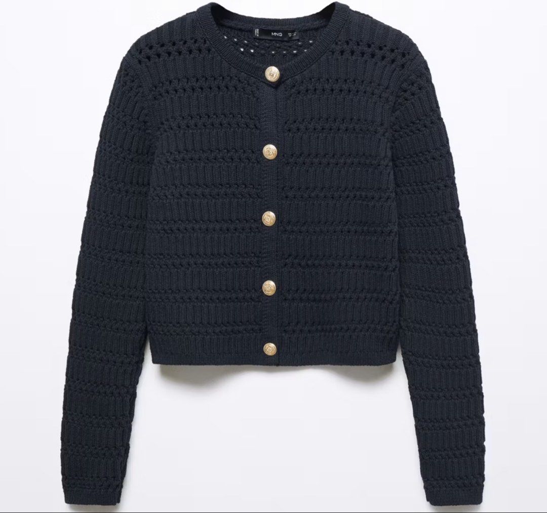 Mango Cropped Knit Cardigan with Gold Buttons (Category: Coats, Jackets and Outerwear) located in Muntinlupa City. Submitted by decluttering22.22 (Listing ID 1449111113, Image 3). Description: - Brand: Mango - Color: Navy - Material: Textured knit - Features: Gold button closures - Length: Cropped - Styling: Pairs well with jeans or skirts - Feel: Comfortable and stylish.
