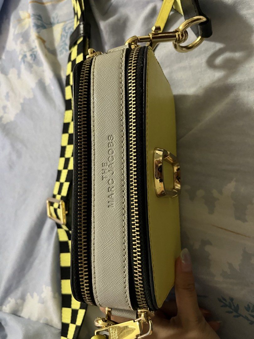 Marc Jacobs The Snapshot Camera Bag Rare Yellow (Category: Luxury Bags & Wallets) located in Manila. Submitted by nyeah (Listing ID 1449287930, Image 2). Description: Open to negotiations! Super chic, can pair with athleisure, business casual, and even semi-formal attire - Yellow Marc Jacobs Snapshot camera bag - Comes with the iconic checkered strap - Elegant gold hardware - Two spacious zip compartments - Convenient back pocket - Ideal for ever